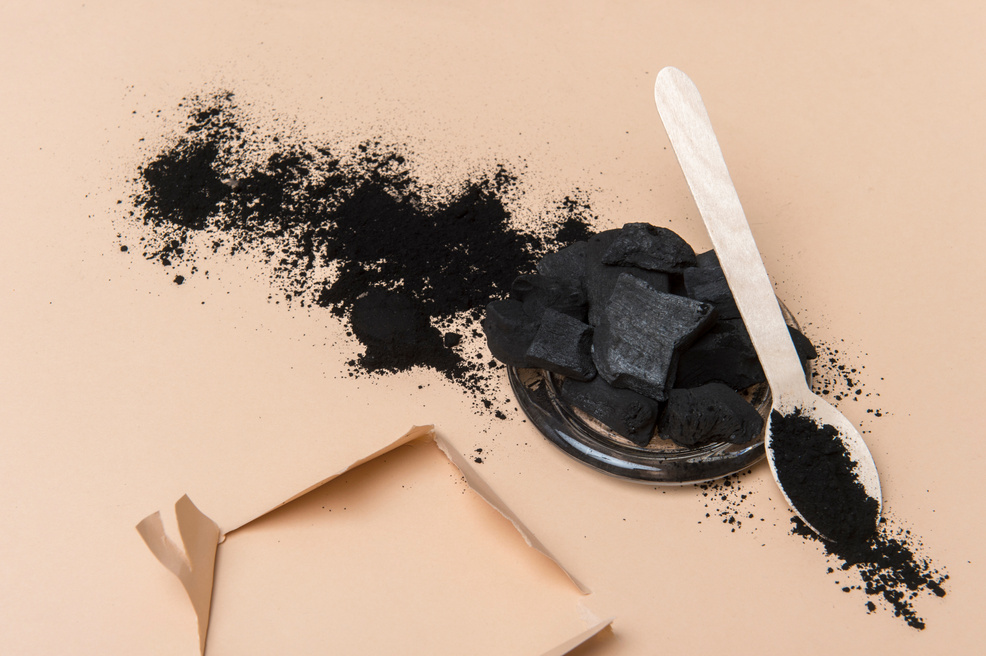 Activated Charcoal And Wooden Spoon